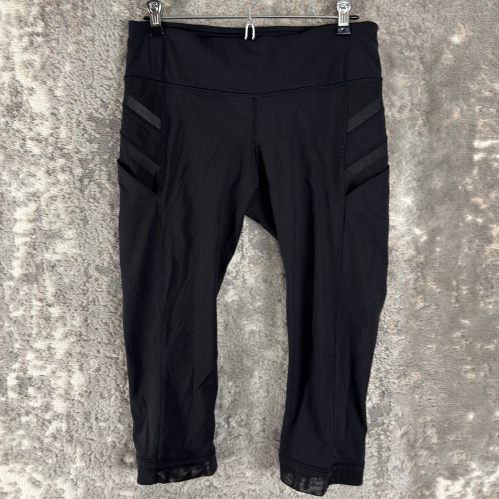 Lululemon Size 8 Mesh Trim Pocket Athletic Yoga Crop Leggings Black Women